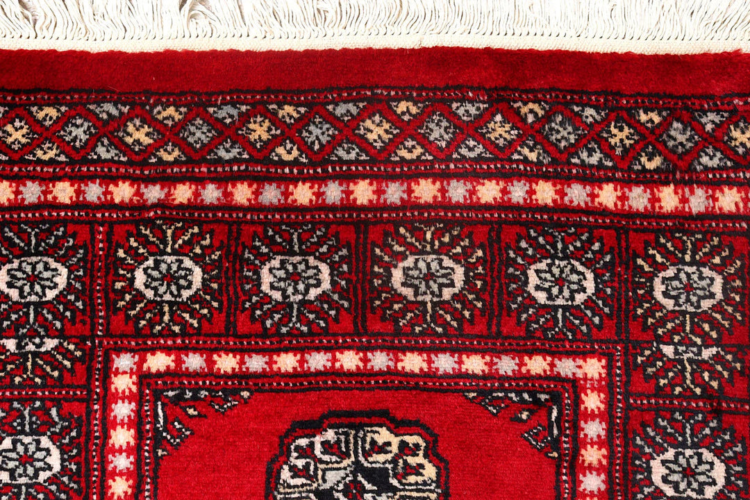 Red Pakistani Bokhara Rug 2' 6" x 9' 4" Hand-Knotted | No. QA73641