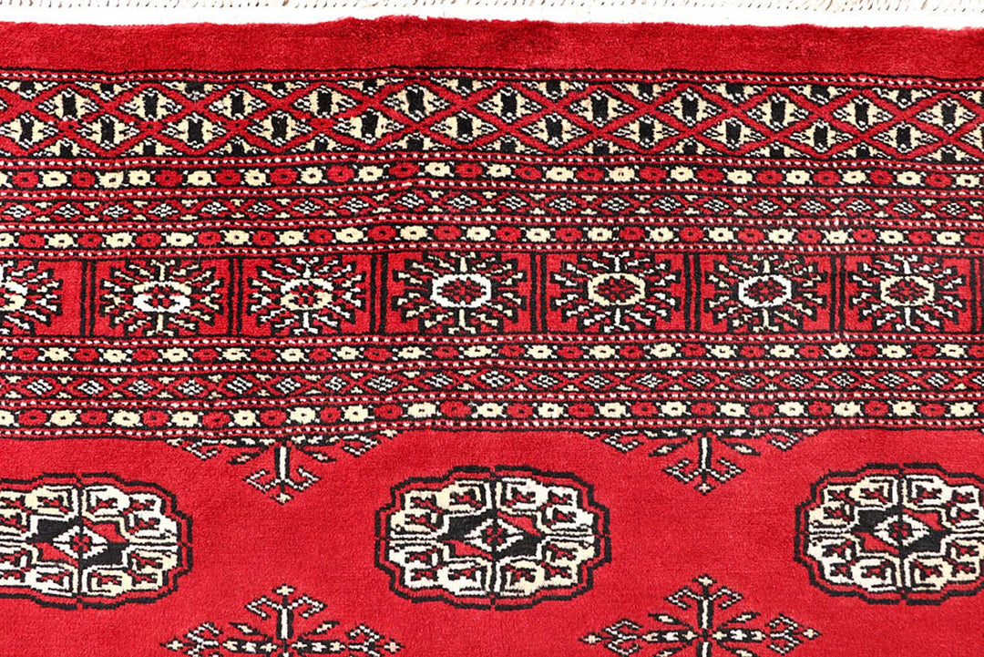 Red Pakistani Bokhara Rug 5' 6" x 8' 4" Hand-Knotted | No. QA73765
