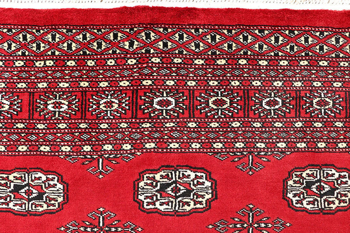 Red Pakistani Bokhara Rug 5' 6" x 8' 4" Hand-Knotted | No. QA73765