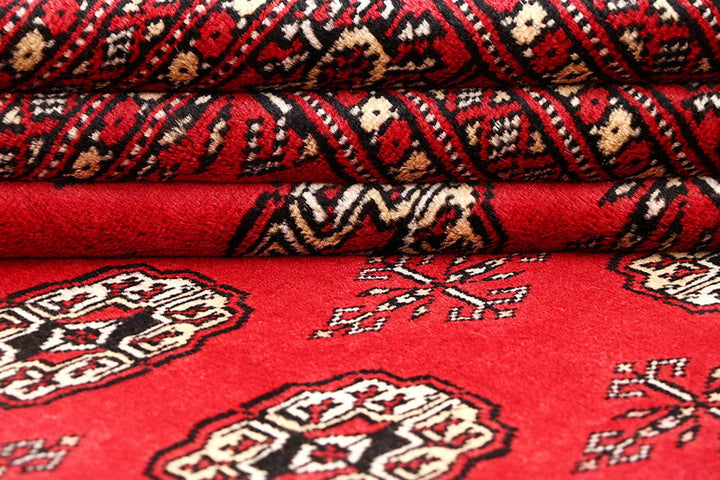 Red Pakistani Bokhara Rug 5' 6" x 8' 4" Hand-Knotted | No. QA73765