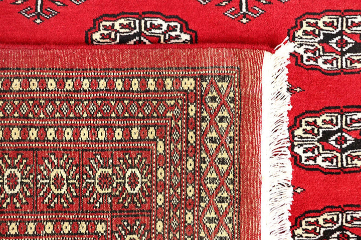 Red Pakistani Bokhara Rug 5' 6" x 8' 4" Hand-Knotted | No. QA73765
