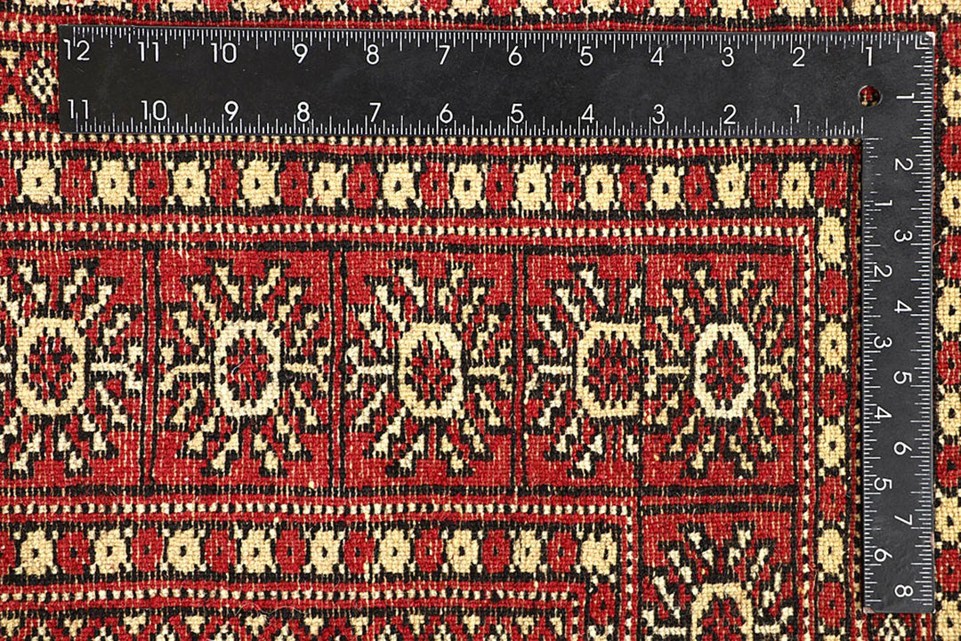 Red Pakistani Bokhara Rug 5' 6" x 8' 4" Hand-Knotted | No. QA73765
