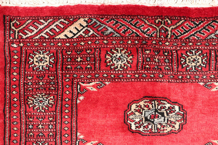 Red Pakistani Bokhara Rug 2' 8" x 10' Hand-Knotted | No. QA74256