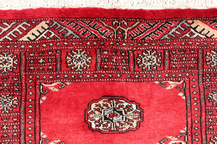 Red Pakistani Bokhara Rug 2' 8" x 10' Hand-Knotted | No. QA74256