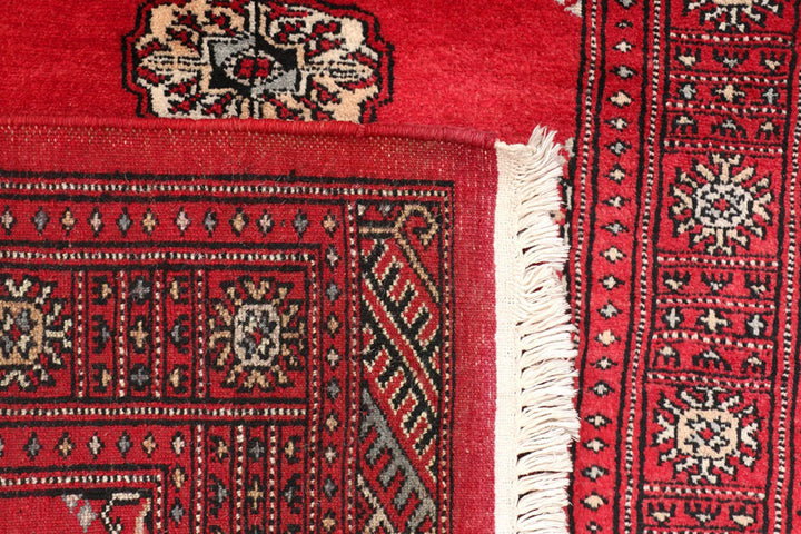 Red Pakistani Bokhara Rug 2' 8" x 10' Hand-Knotted | No. QA74256