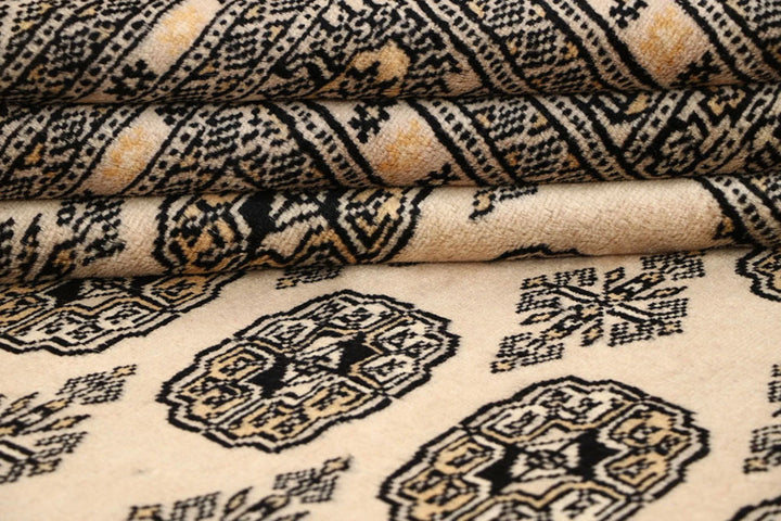 Bisque Pakistani Bokhara Rug 6' 1" x 9' 1" Hand-Knotted | No. QA74268