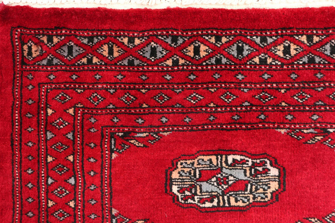 Dark Red Bokhara Rug 2' x 6' Hand-Knotted | No. QA74477