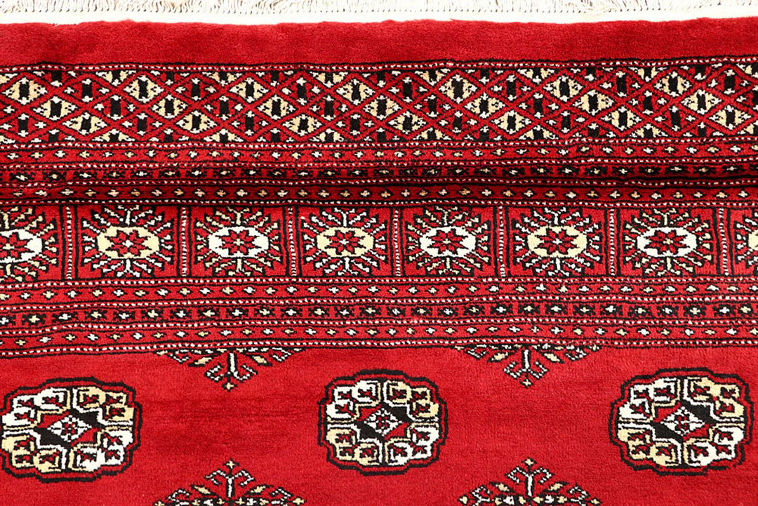 Red Pakistani Bokhara Rug 9' 3" x 12' 6" Hand-Knotted | No. QA74993