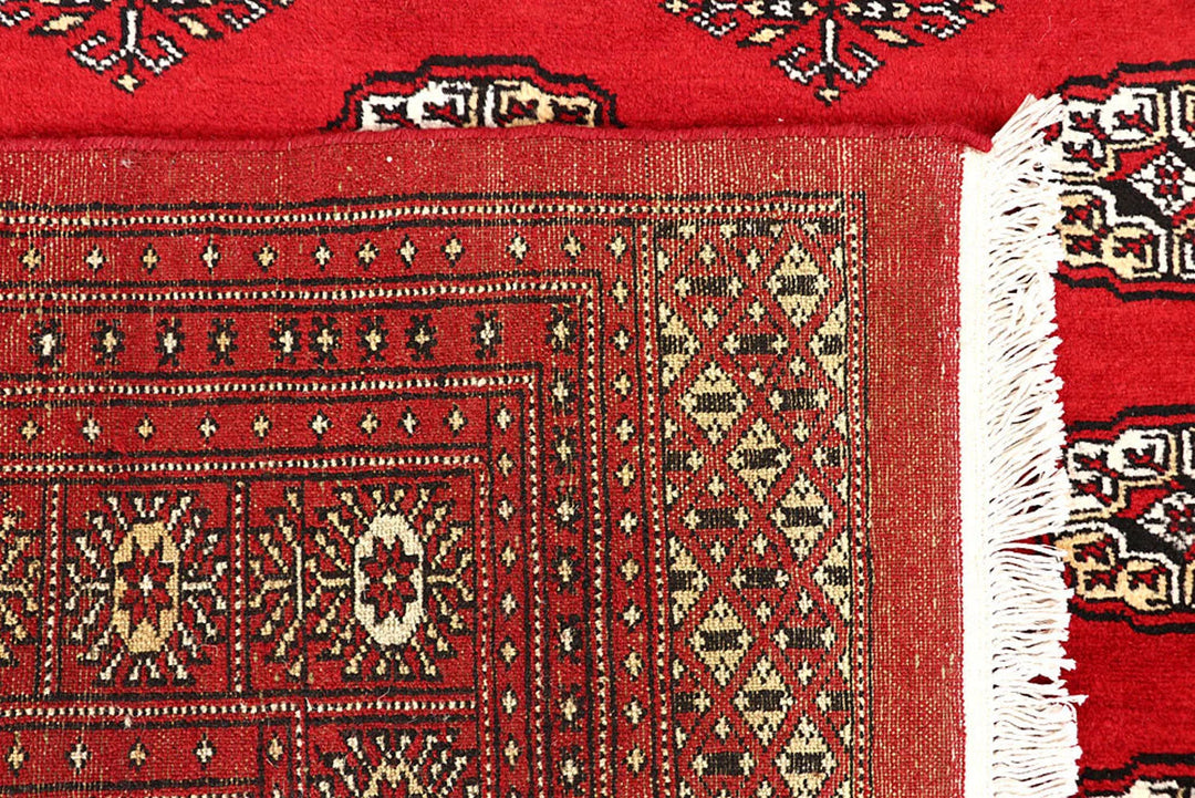 Red Pakistani Bokhara Rug 9' 3" x 12' 6" Hand-Knotted | No. QA74993