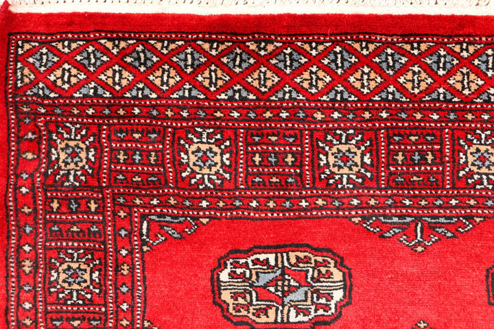 Red Pakistani Bokhara Rug 3' 1" x 5' 5" Hand-Knotted | No. QA75026