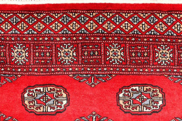 Red Pakistani Bokhara Rug 3' 1" x 5' 5" Hand-Knotted | No. QA75026