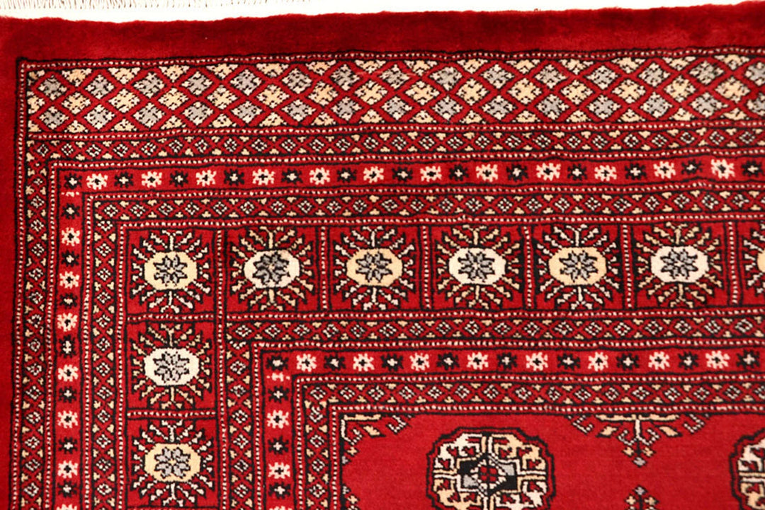Red Pakistani Bokhara Rug 9' 4" x 12' 4" Hand-Knotted | No. QA75245