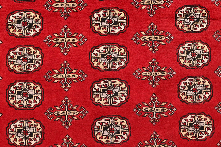 Red Pakistani Bokhara Rug 9' 4" x 12' 4" Hand-Knotted | No. QA75245