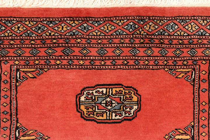 Salmon Pakistani Bokhara Rug 2' 7" x 8' 4" Hand-Knotted | No. QA75408