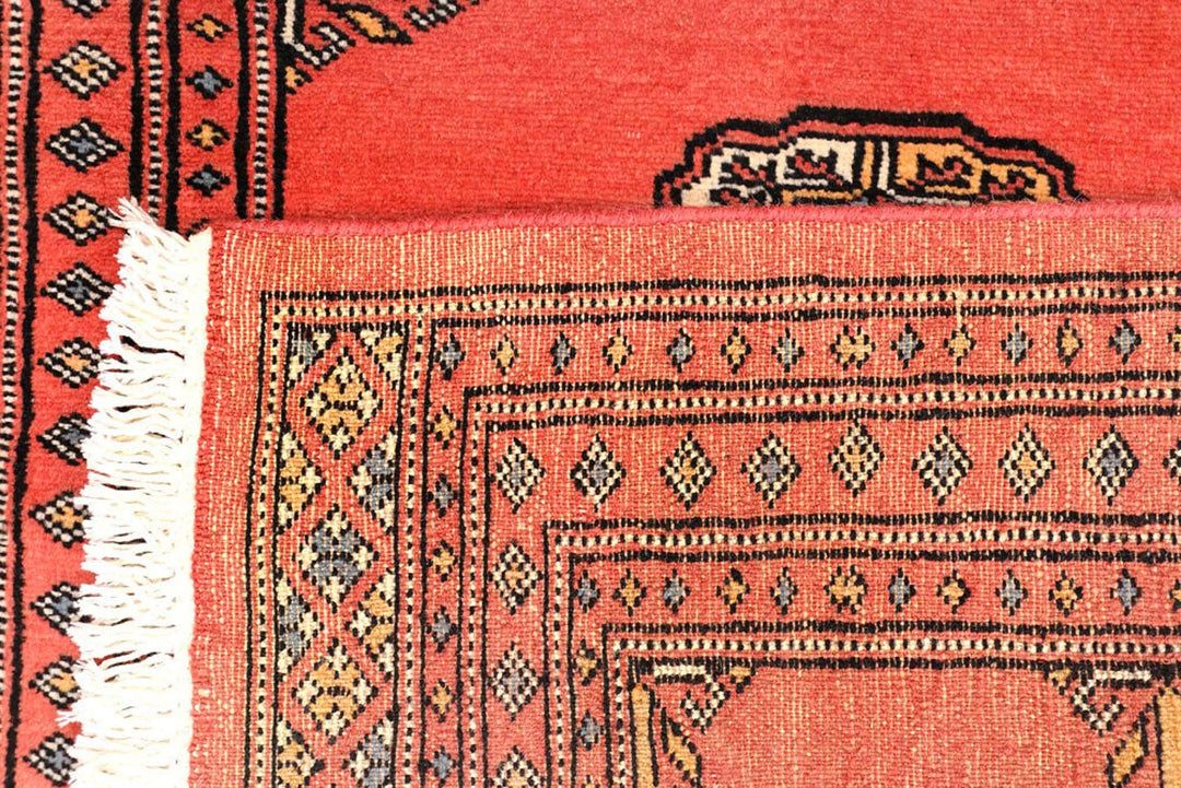 Salmon Pakistani Bokhara Rug 2' 7" x 8' 4" Hand-Knotted | No. QA75408