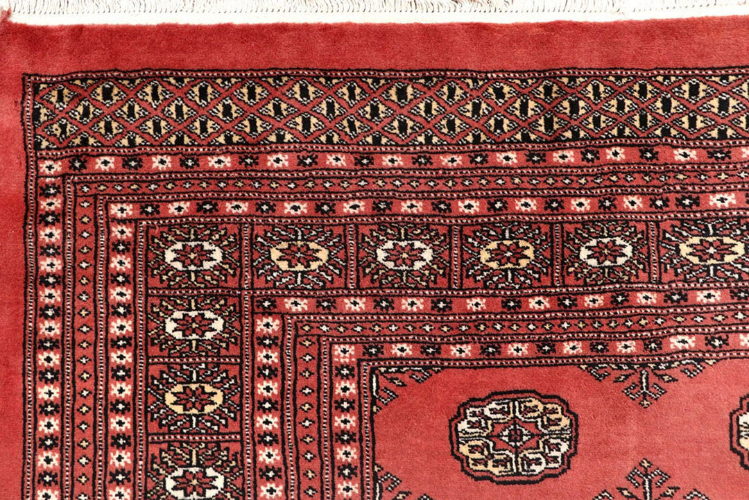 Salmon Pakistani Bokhara Rug 8' x 10'2" Hand-Knotted | No. QA75705
