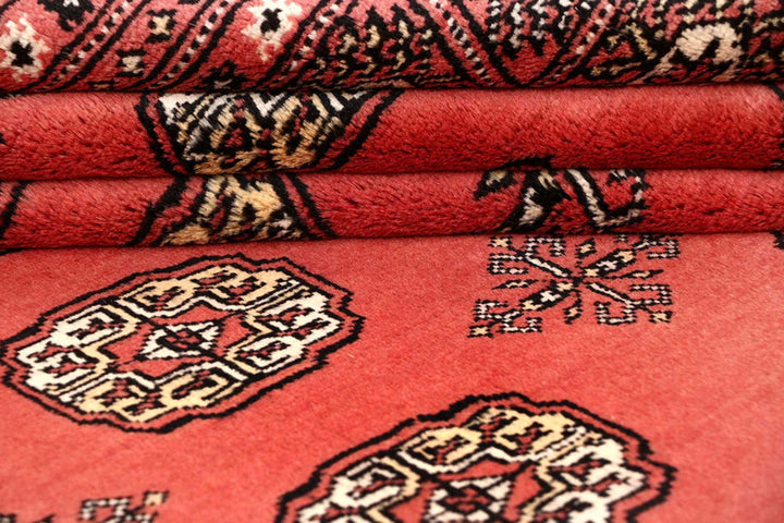 Salmon Pakistani Bokhara Rug 8' x 10'2" Hand-Knotted | No. QA75705