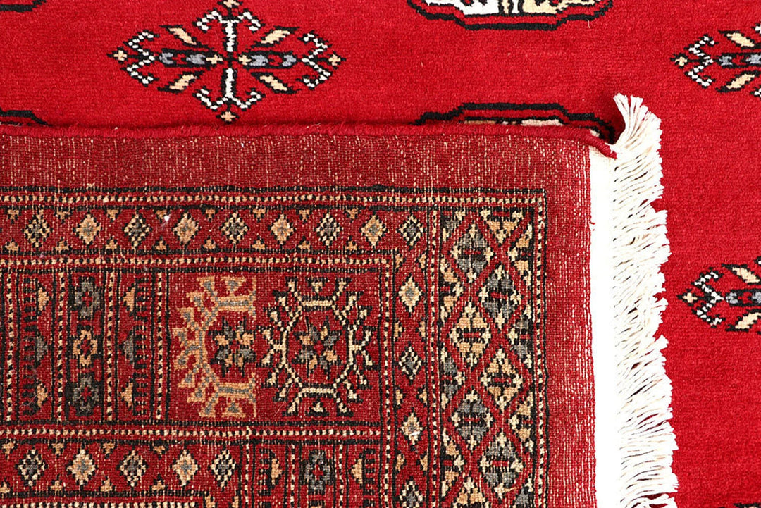 Red Pakistani Bokhara Rug 4' x 6' 4" Hand-Knotted | No. QA75894