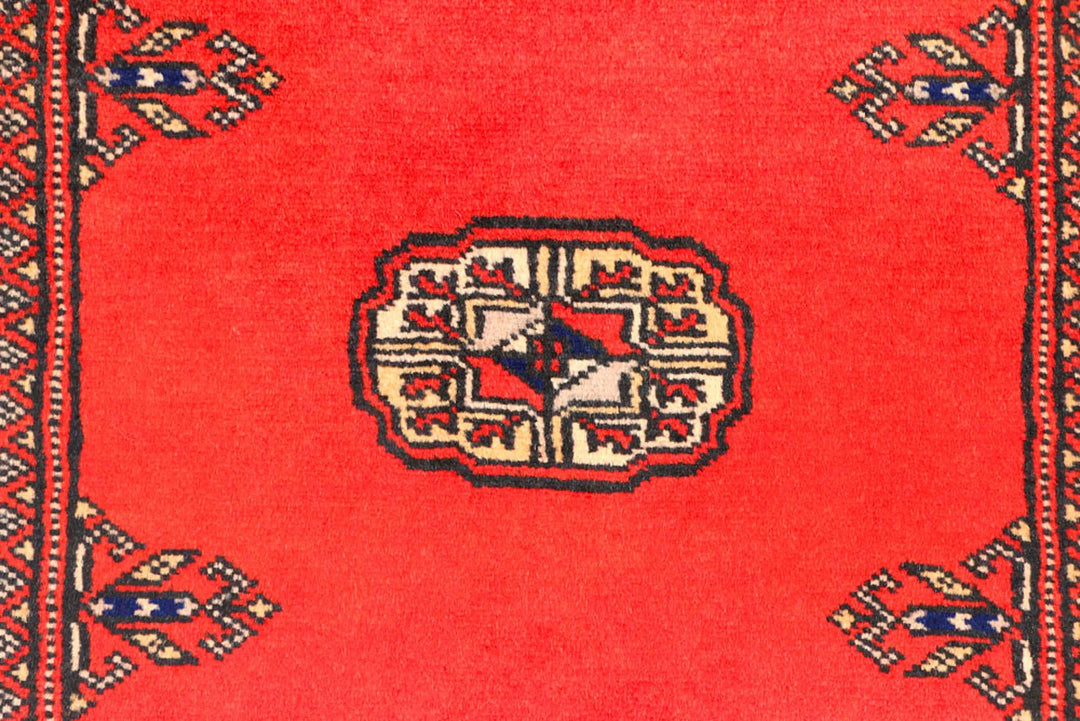 Red Pakistani Bokhara Rug 2' 6" x 12' 1" Hand-Knotted | No. QA76576