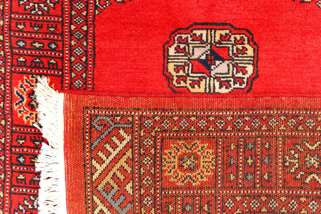 Red Pakistani Bokhara Rug 2' 6" x 12' 1" Hand-Knotted | No. QA76576