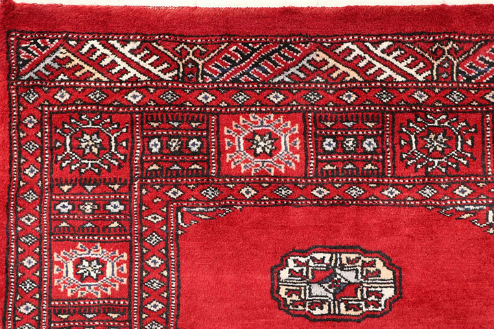 Red Pakistani Bokhara Rug 4' 1" x 6' Hand-Knotted | No. QA76602