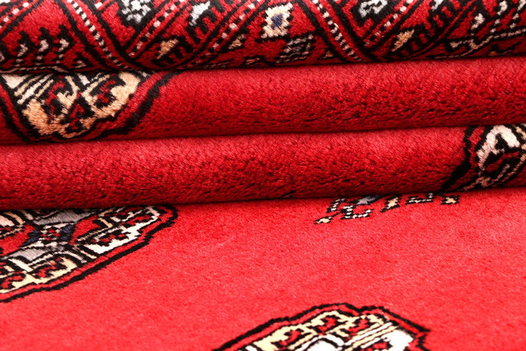 Red Pakistani Bokhara Rug 4' 1" x 6' Hand-Knotted | No. QA76602