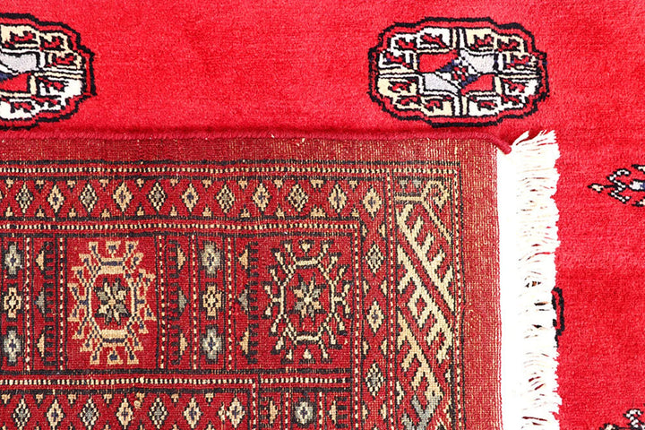 Red Pakistani Bokhara Rug 4' 1" x 6' Hand-Knotted | No. QA76602