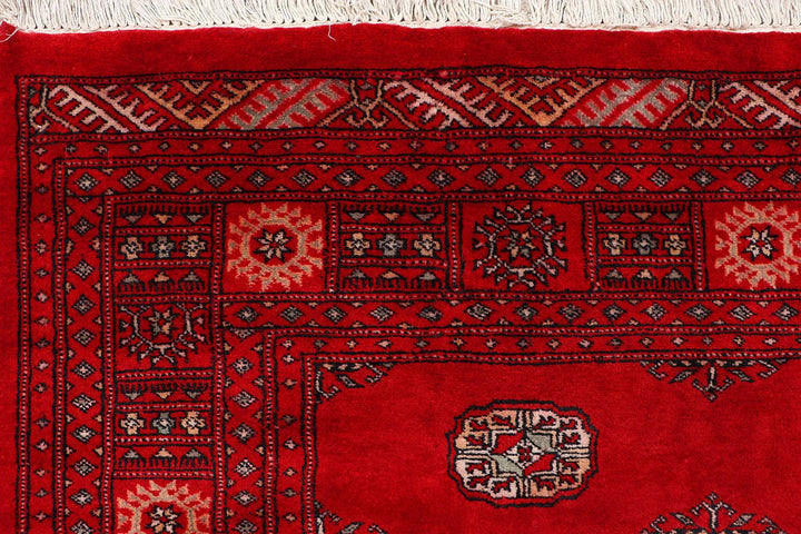 Red Pakistani Bokhara Rug 4' 6" x 6' 8" Hand-Knotted | No. QA76639