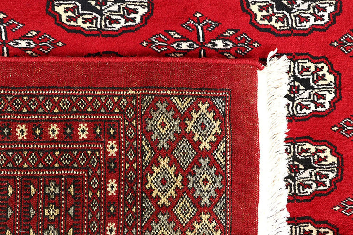Red Pakistani Bokhara Rug 6' 1" x 9' 2" Hand-Knotted | No. QA77231