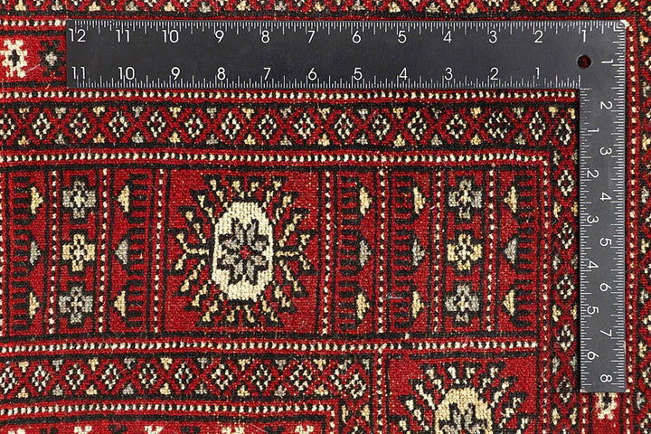 Red Pakistani Bokhara Rug 6' 1" x 9' 2" Hand-Knotted | No. QA77231