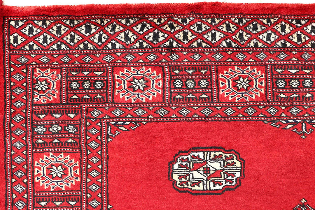 Red Bokhara Rug 4' 2" x 6' 3" Hand-Knotted | No. QA77640