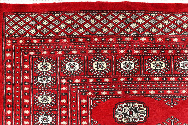 Red Pakistani Bokhara Rug 6' 1" x 9' 6" Hand-Knotted | No. QA78188