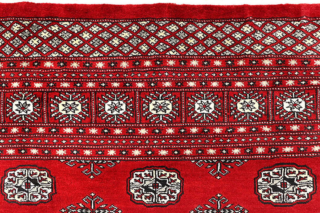 Red Pakistani Bokhara Rug 6' 1" x 9' 6" Hand-Knotted | No. QA78188