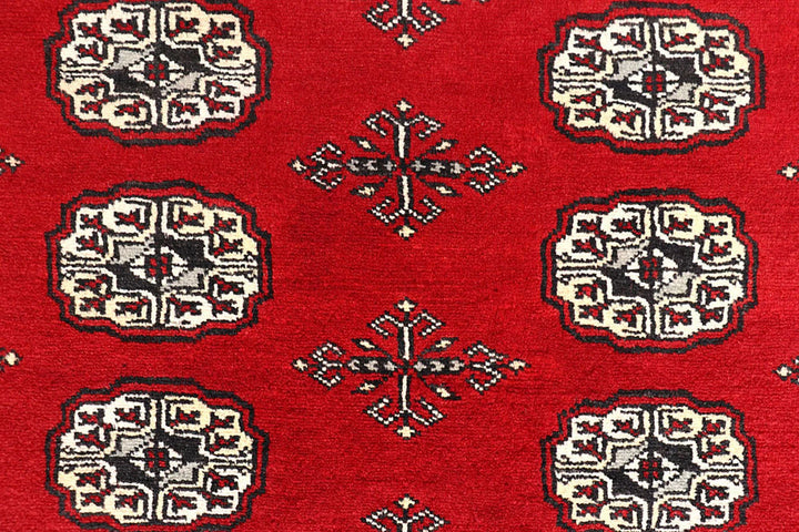 Red Pakistani Bokhara Rug 6' 1" x 9' 6" Hand-Knotted | No. QA78188
