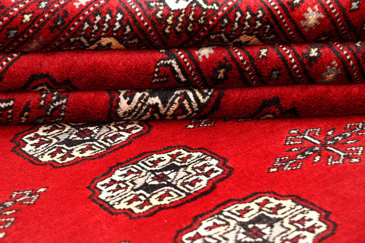 Red Pakistani Bokhara Rug 6' 1" x 9' 6" Hand-Knotted | No. QA78188