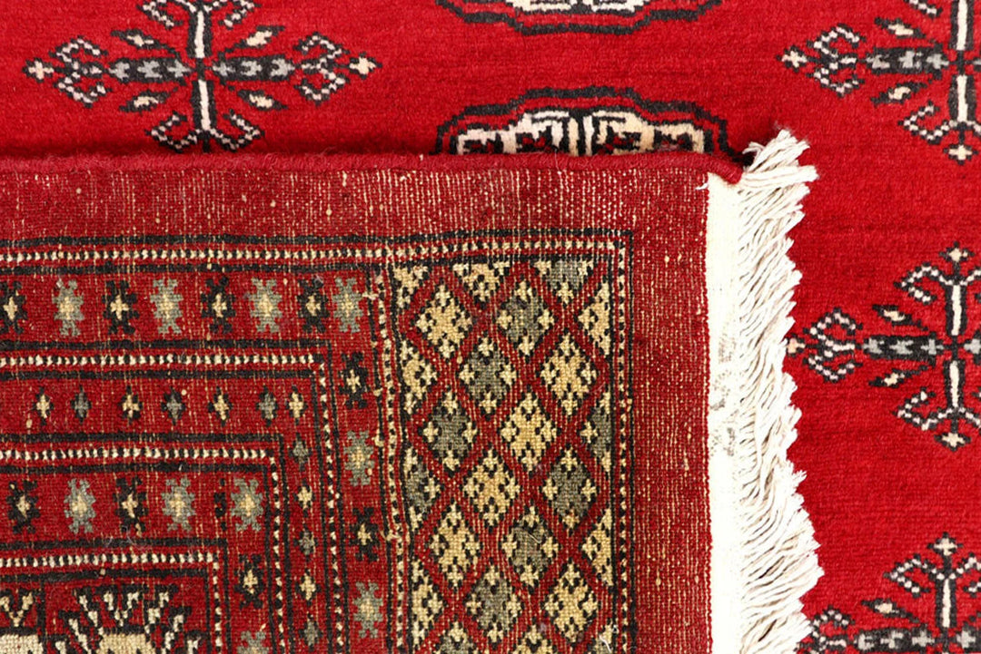 Red Pakistani Bokhara Rug 6' 1" x 9' 6" Hand-Knotted | No. QA78188