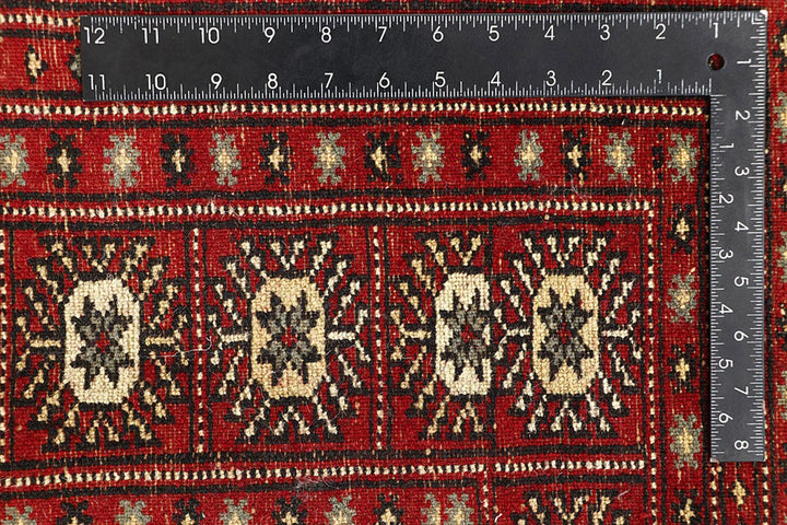Red Pakistani Bokhara Rug 6' 1" x 9' 6" Hand-Knotted | No. QA78188