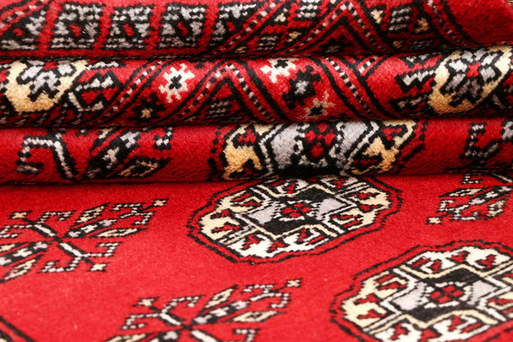 Firebrick Red Pakistani Bokhara Rug 5' 1" x 7' 10" Hand-Knotted | No. QA78385
