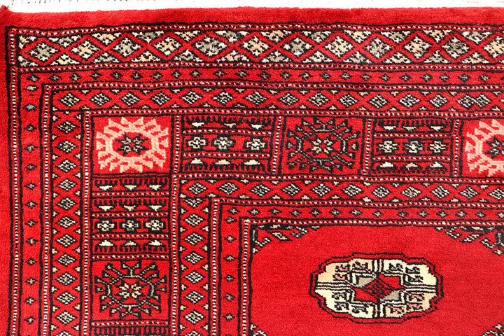 Red Pakistani Bokhara Rug 4' 2" x 6' 2" Hand-Knotted | No. QA78976