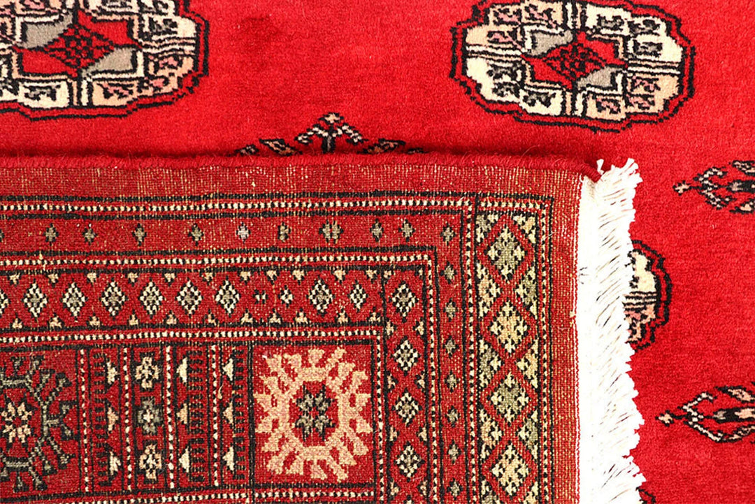 Red Pakistani Bokhara Rug 4' 2" x 6' 2" Hand-Knotted | No. QA78976