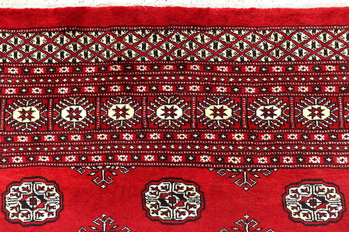 Red Pakistani Bokhara Rug 6' 1" x 8' 10" Hand-Knotted | No. QA79187