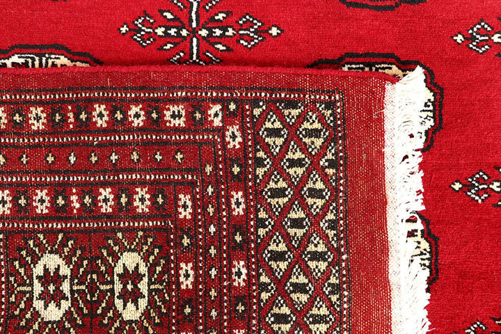 Red Pakistani Bokhara Rug 6' 1" x 8' 10" Hand-Knotted | No. QA79187