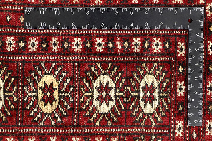 Red Pakistani Bokhara Rug 6' 1" x 8' 10" Hand-Knotted | No. QA79187