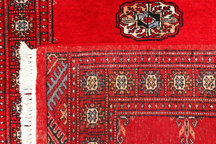 Dark Red Pakistani Bokhara Rug 2' 7" x 9' 1" Hand-Knotted | No. QA79263