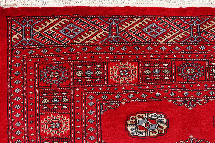 Red Pakistani Bokhara Rug 4' 1" x 6' 1" Hand-Knotted | No. QA79325