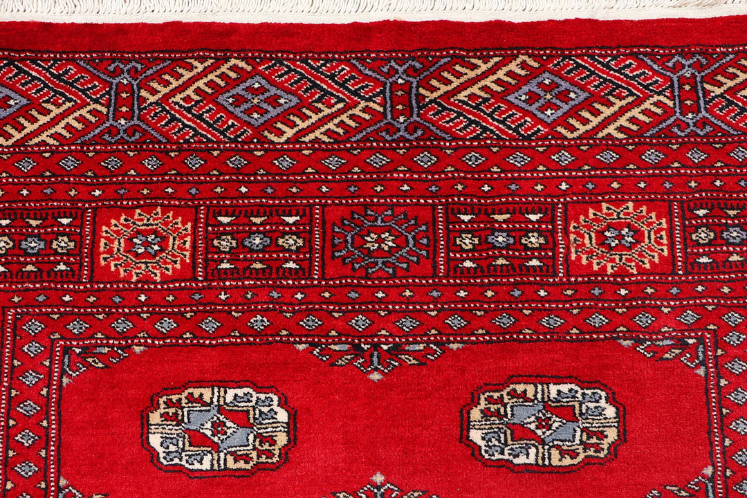 Red Pakistani Bokhara Rug 4' 1" x 6' 1" Hand-Knotted | No. QA79325