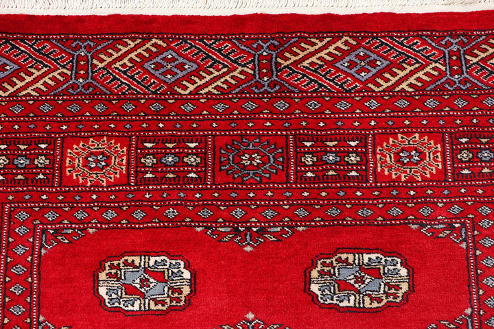 Red Pakistani Bokhara Rug 4' 1" x 6' 1" Hand-Knotted | No. QA79325