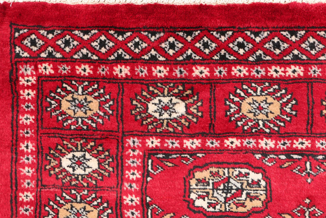 Dark Red Pakistani Bokhara Rug 3' 1" x 5' 1" Hand-Knotted | No. QA79688