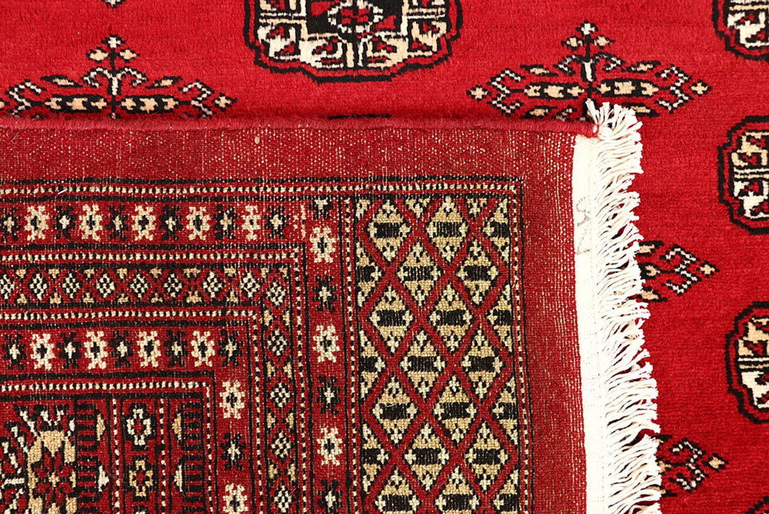 Red Pakistani Bokhara Rug 9' 1" x 11' 6" Hand-Knotted | No. QA80456