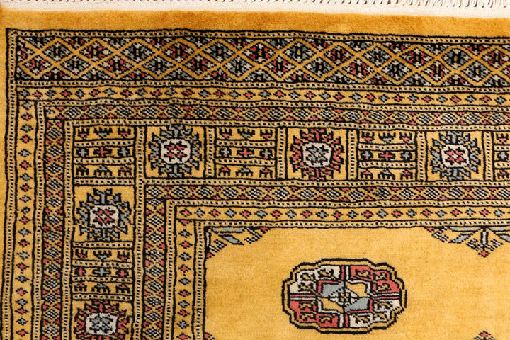 Goldenrod Pakistani Bokhara Rug 4' 1" x 6' 6" Hand-Knotted | No. QA81067